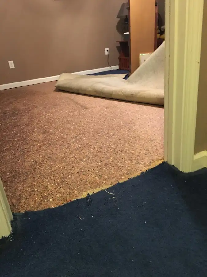 Carpet pad removal revealing water damage during Drying & Dehumidification in Cheney